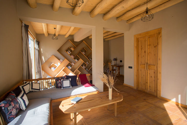 Living room with handcrafted Ladakhi bookshelf