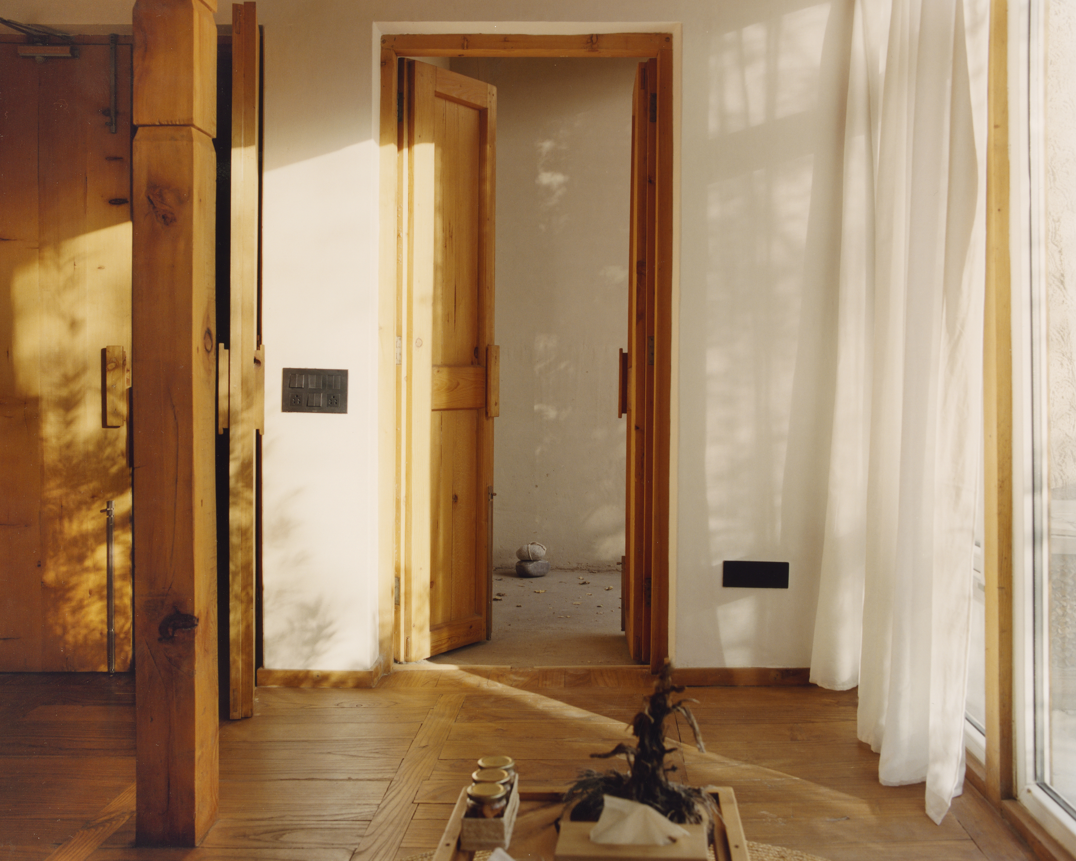 Bedroom corner with carved wooden detail